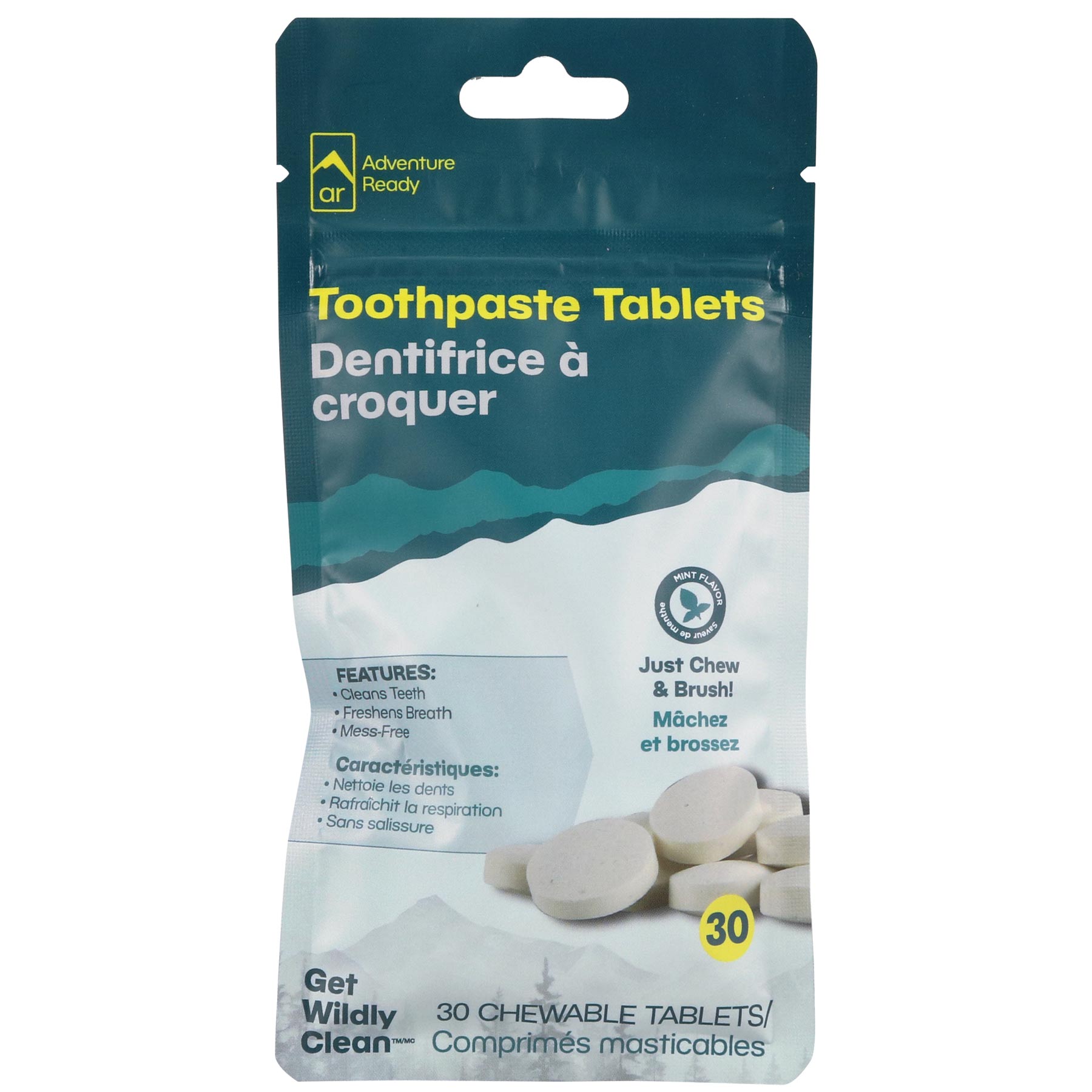 The Adventure Ready Toothpaste Tablets in packaging on a white background. The packaging includes the brand logo, product name, the features, a tagline, and noting it contains 30 tablets. This packaging also includes French translations.