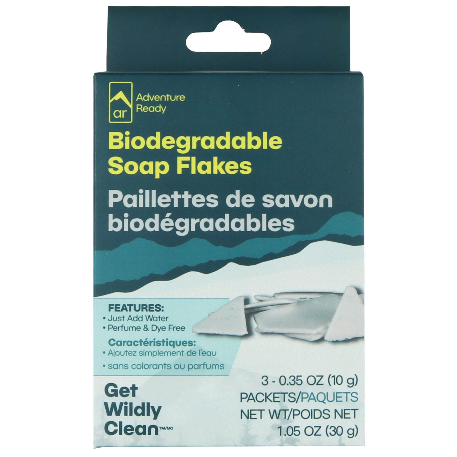 The Adventure Ready Biodegradable Soap Flakes packaging on a white background. On the box is the brand logo and product name. There is also a call out of the feature to just add water to the flakes, while it is also perfume and dye free. The box includes the brand tagline and a call out for the contents of 3 - 0.35oz packets and a net weight of 1.05oz. There are also
French translations on the box.