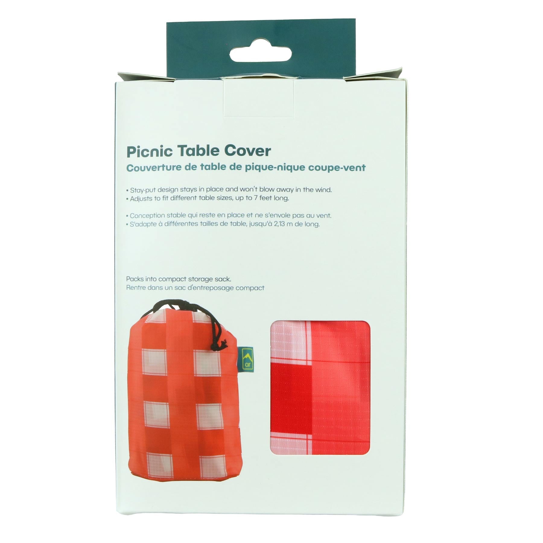 This image shows the back packaging of the Adventure Ready Wildly Fun Picnic Cloth - Red Gingham on white background. The back of packaging mentions the stay-put design and adjustability. It shows the product capable to be packed compact into a storage sack. There is also a window to allow the for an actual touch and feel of the fabric.