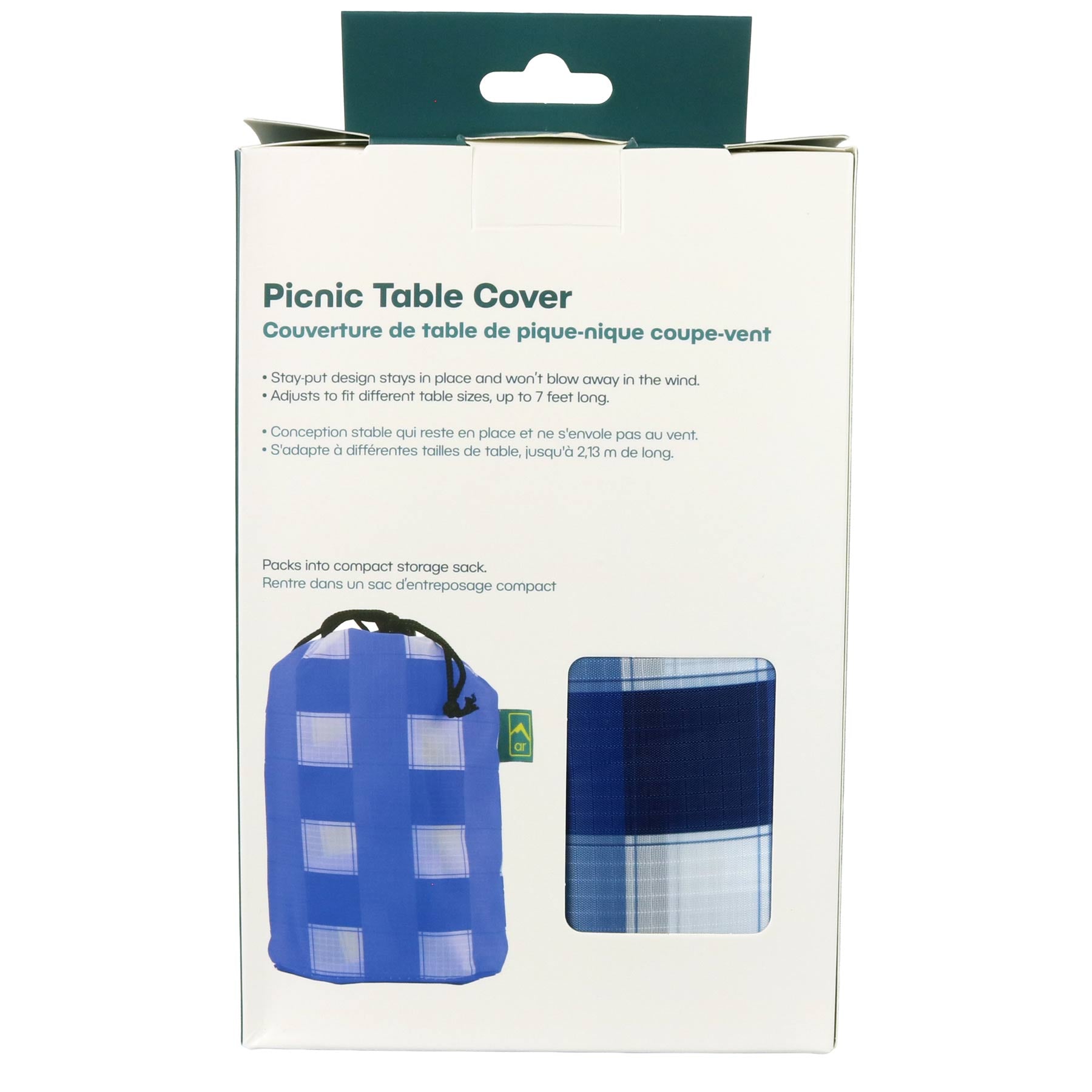 This image shows the back packaging of the Adventure Ready Wildly Fun Picnic Cloth - Blue Gingham on white background. The back of packaging mentions the stay-put design and adjustability. It shows the product capable to be packed compact into a storage sack. There is also a window to allow the for an actual touch and feel of the fabric.