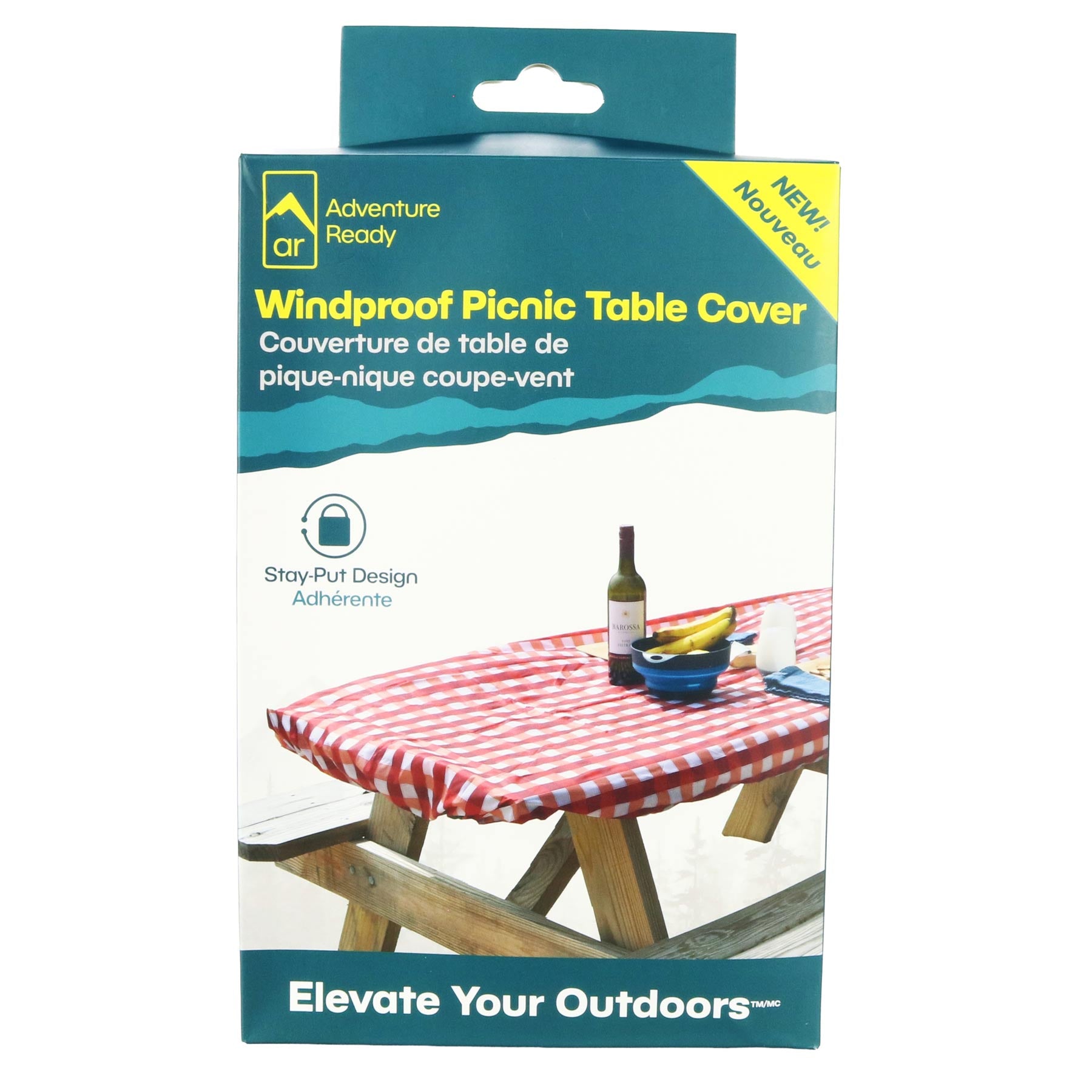 The Adventure Ready Picnic Table Cover packaging on a white background. The packaging shows the brand logo, product name, calls out the stay-put design, a tagline, and shows the product on a picnic table. The packaging has both English and French.